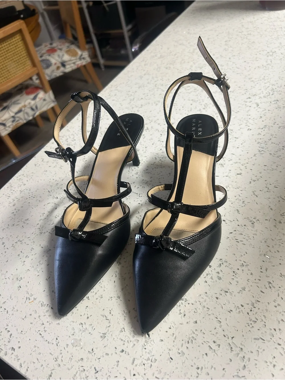 Alex Marie Black Pointed-Toe T-Strap Heels with Bow Accent